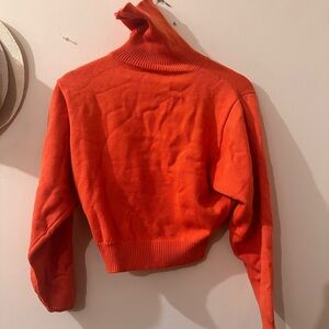 New without tag, orange Zara sweater on size medium